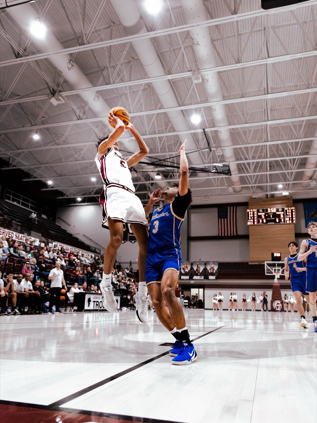 Aiden Bezenah rising for a jump shot over a defender